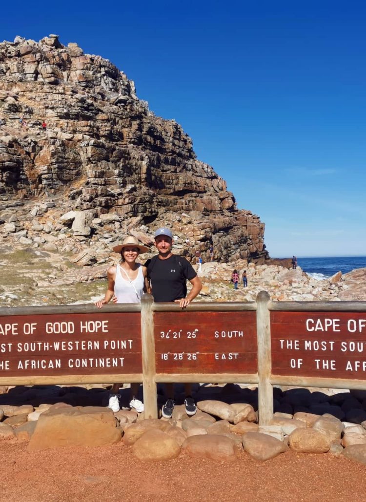 Standing at the Sign of Cape of Good Hope - a part of visiting Cape Point