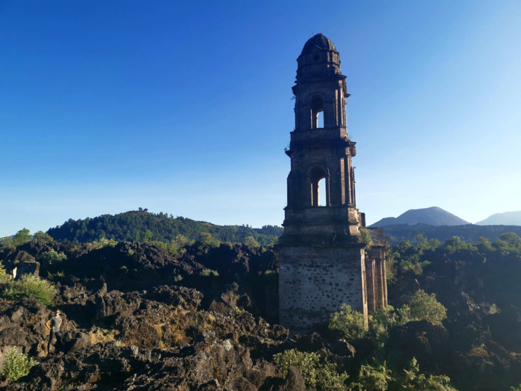 The tower of the buried church poking out next to Paricutin Volcano