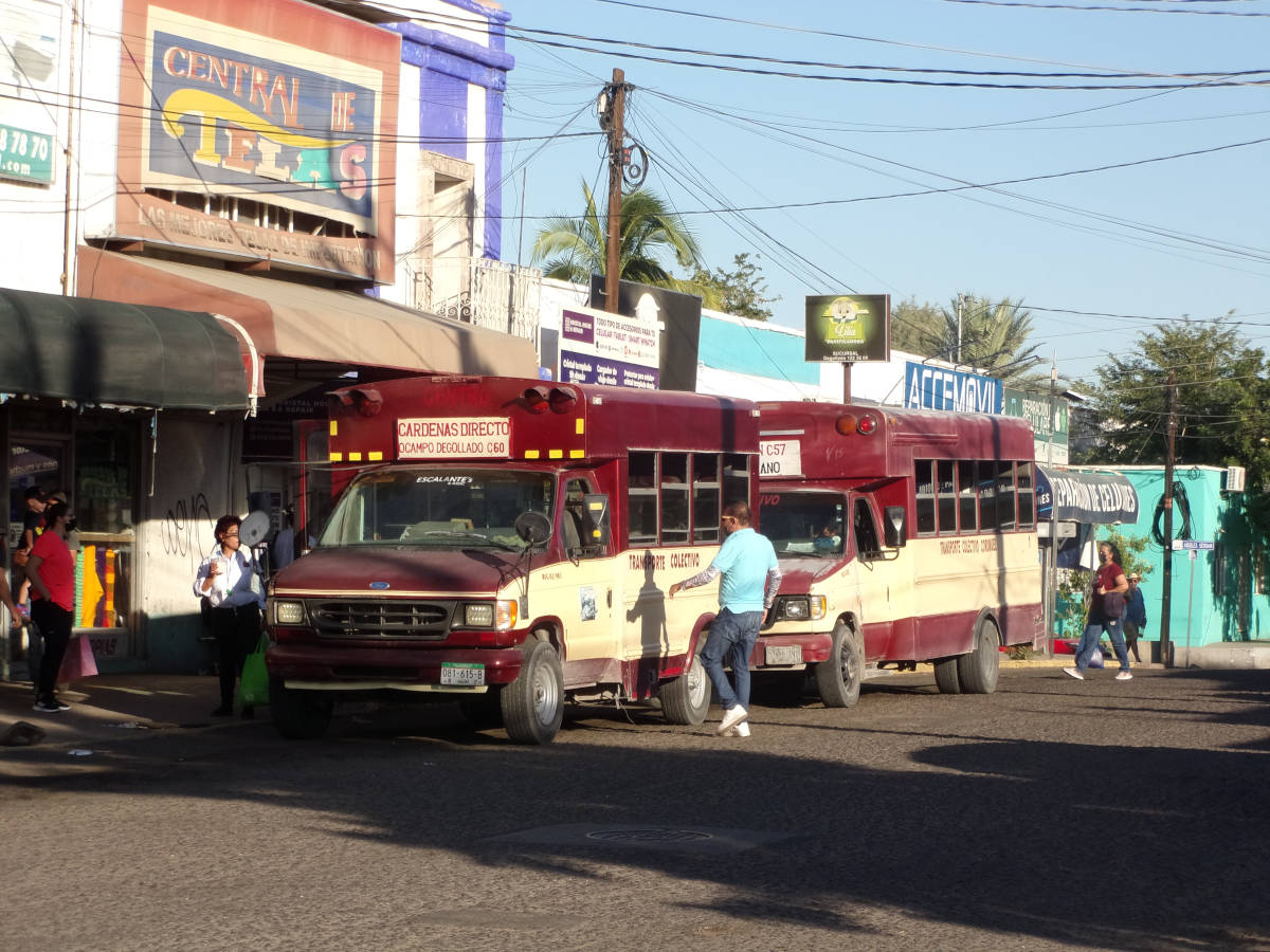 Old U.S. school buses used as collectivos in La Paz Mexico