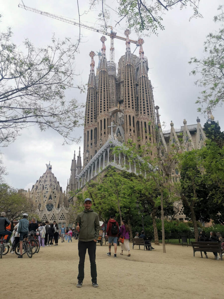 Allan standing in front of the Sagrada Familia