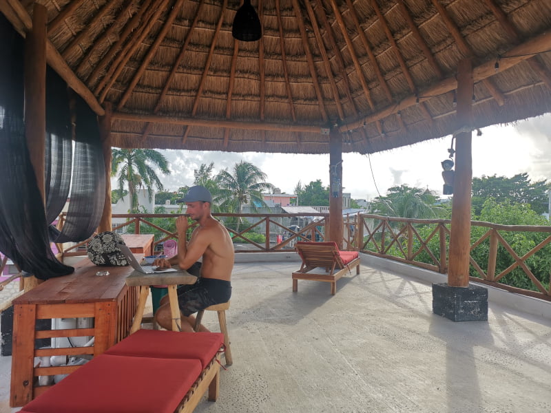 Working as a digital nomad on the rooftop at Casa Ruli in Playa del Carmen