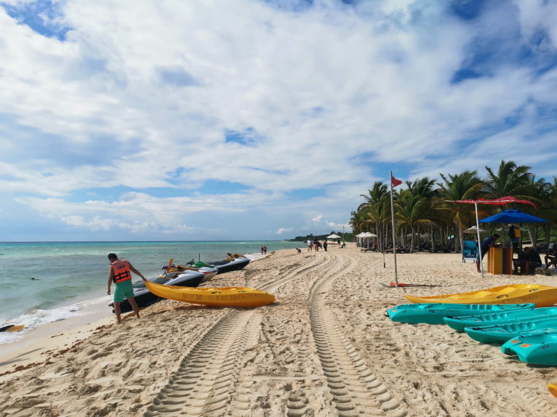 Playacar beach in Playa del Carmen with lot of colorful kayaks