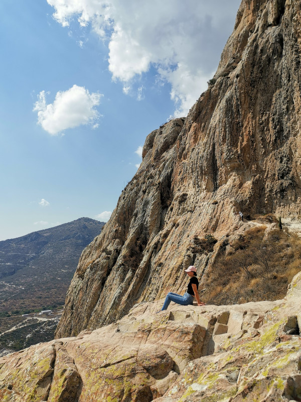 Katharina sitting on a rock enjoying the view at the top of Peña de Bernal