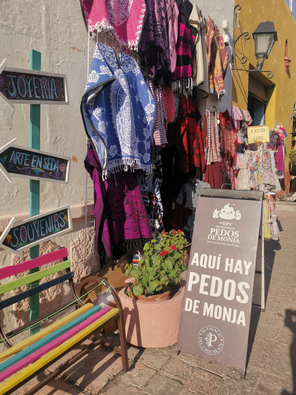 A sign advertising Pedos de Monja, one of the top things to do in Querétaro for foodies  