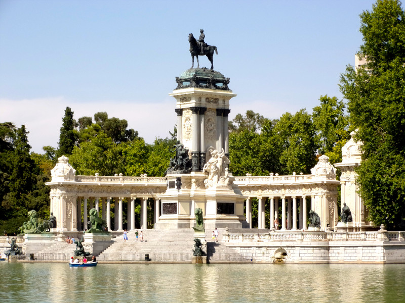 People enjoying the lake at Retiro Park a great free thing to do in Madrid