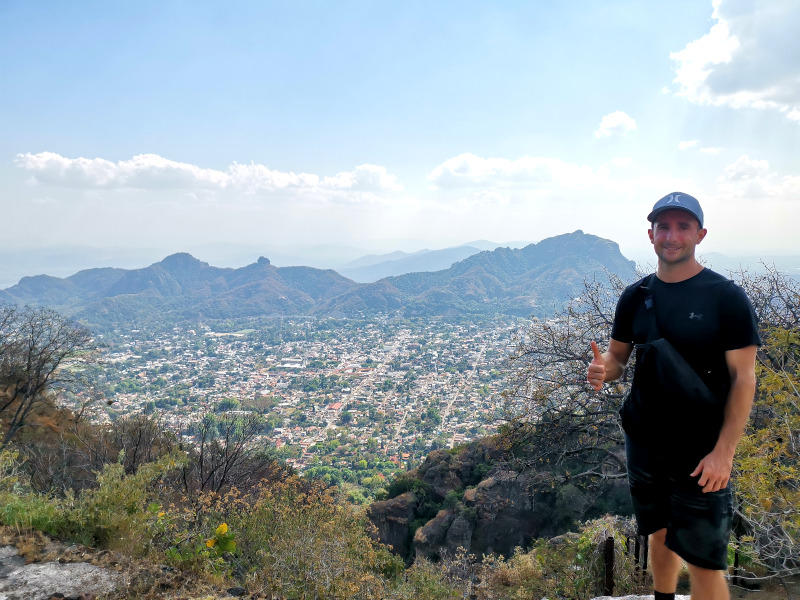Allan overlooking the town of Tepoztlán with mountains in the back 