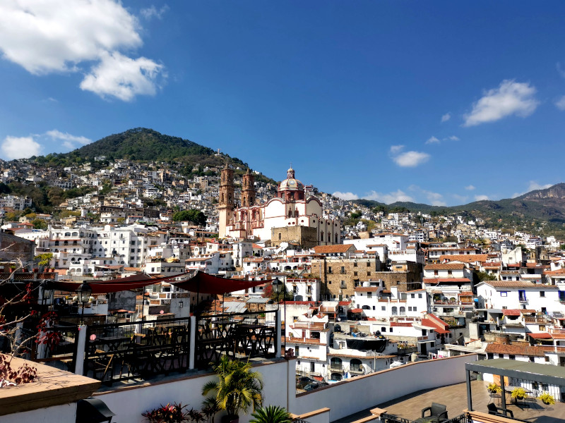The view of the central church in Taxco Mexico from Rosa Mexicano Restaurant