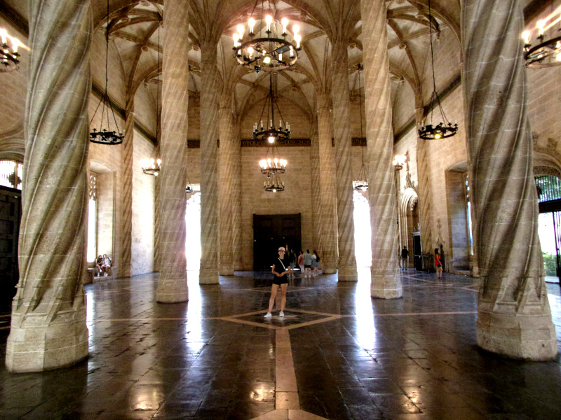 Katharina standing inside The Trade Hall at the Silk exchange a great free thing to do in Valencia on Sunday