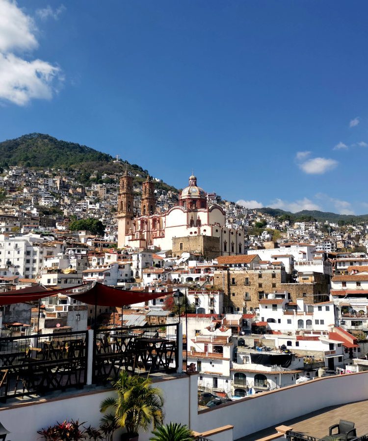 View over the city of Taxco with the central church - one of the top things to do in Taxco, Mexico