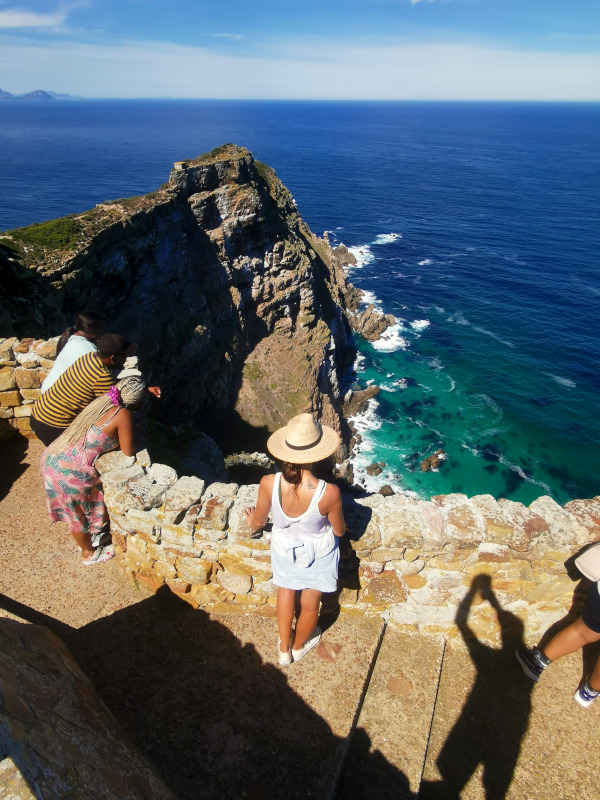 The view of super clear blue water from the top of Cape Point