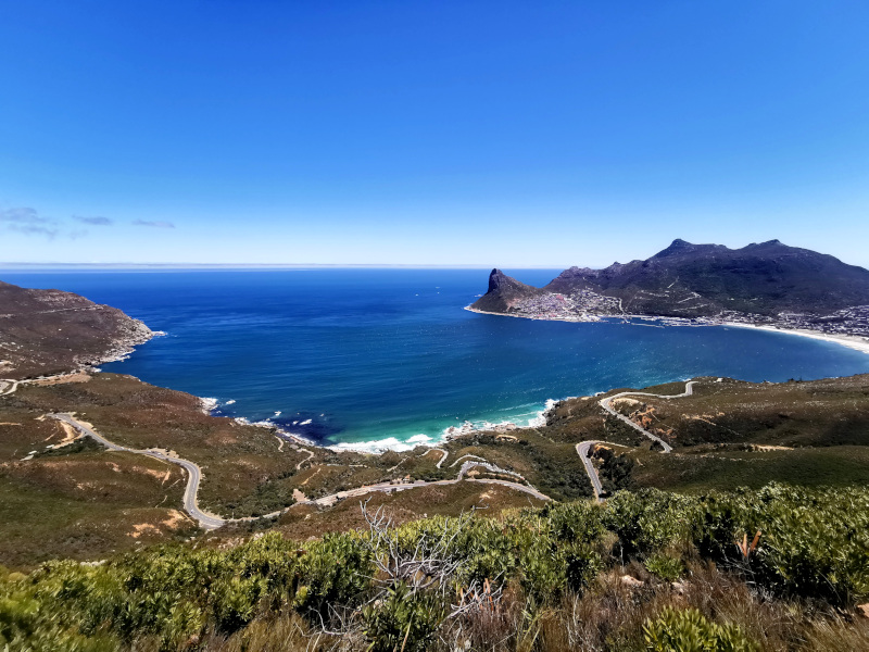 View over Hout bay from the Chapmans Peak hike on of the best hikes around Cape Town