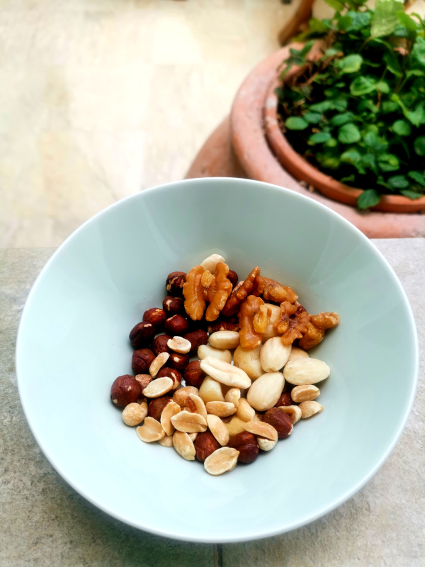 A bowl of nuts a great way how to eat healthy and cheap while traveling