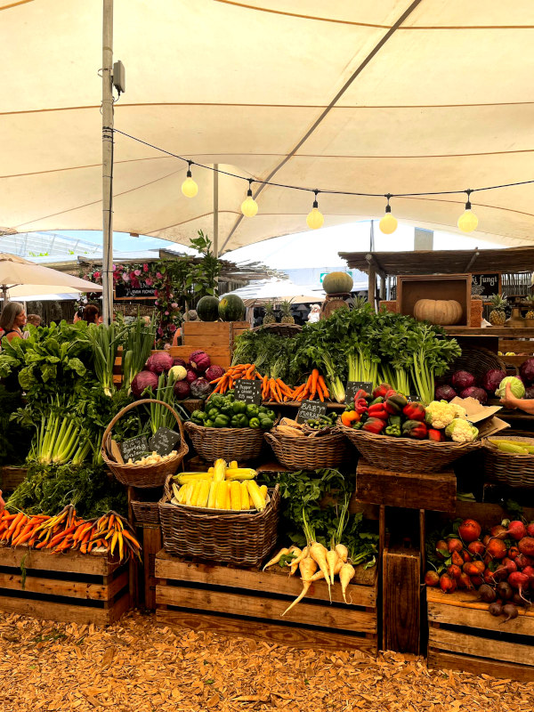 A stand of fresh fruits and vegetables at a market in Cape Town South Africa
