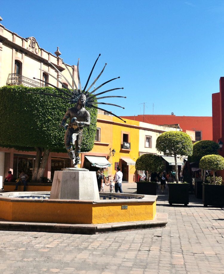 Color full square with a statue one of the top things to do in Queretaro