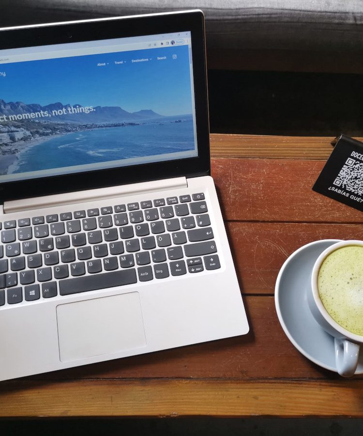 Laptop on table in a cafe in La Paz one of the best cities in Mexico for digital nomads