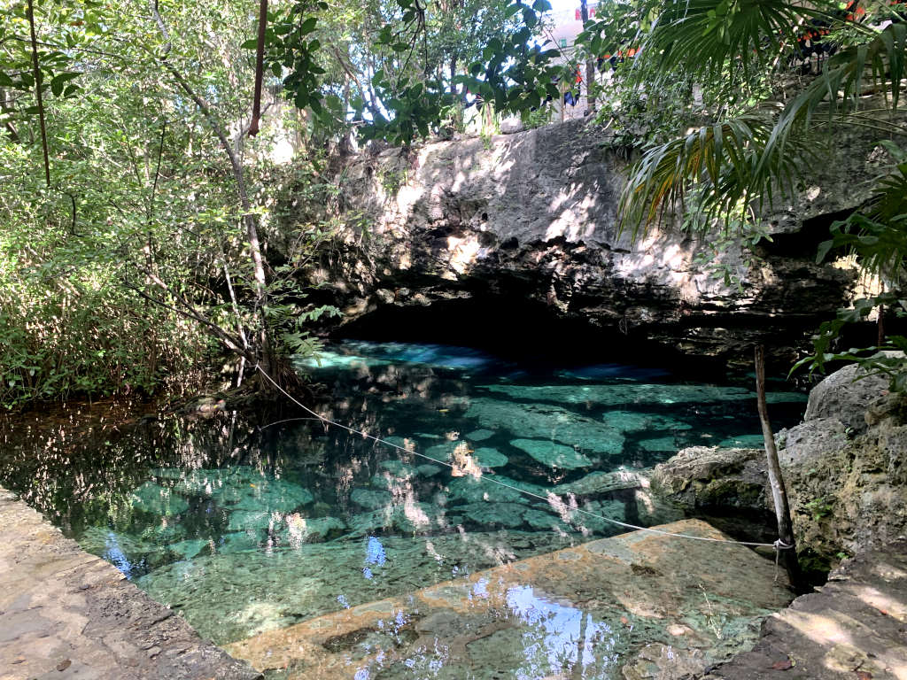 First pool at Cenote Cristalino with crystal clear blue water