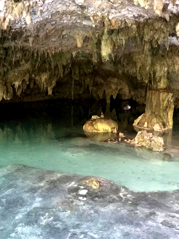 Cave covered in stalactites at Cenote Sac Actun  - one of the best cenotes Playa del Carmen