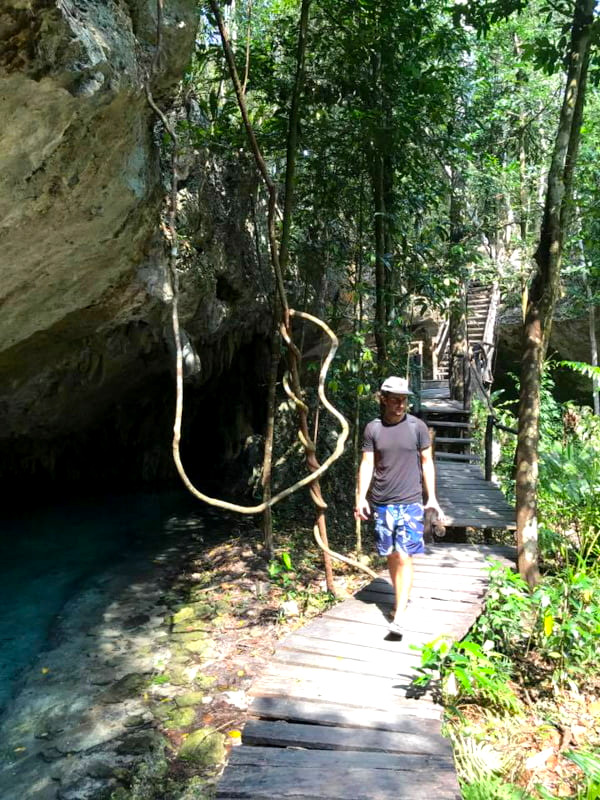 Walking down the walkway at Cenote Sac Actun  - one of the best cenotes Playa del Carmen