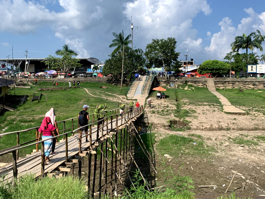 A bridge connecting two river banks in Leticia in the dry season 