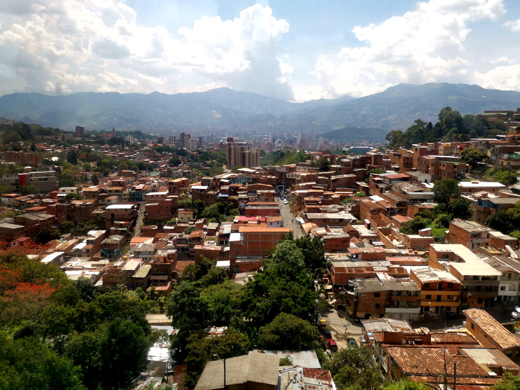 A view from a cable car in Medellin over the top of the La Sierra neighborhood