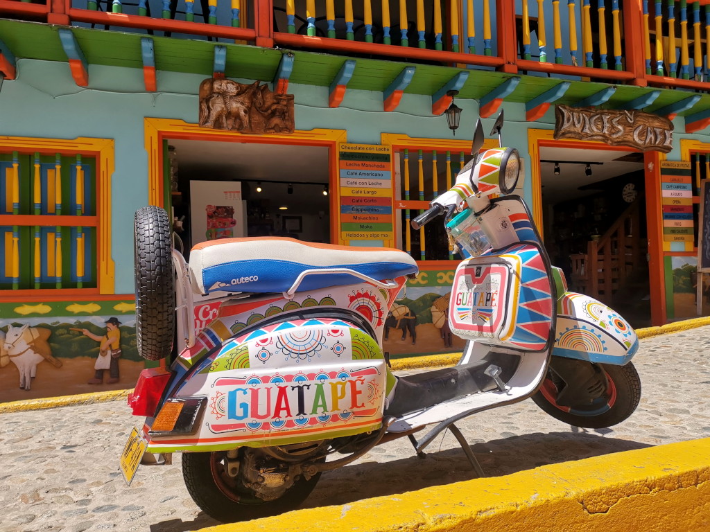 A colorful motorcycle with Guatapé written on it