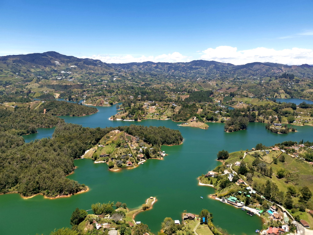 The lake around Guatape and green hills 