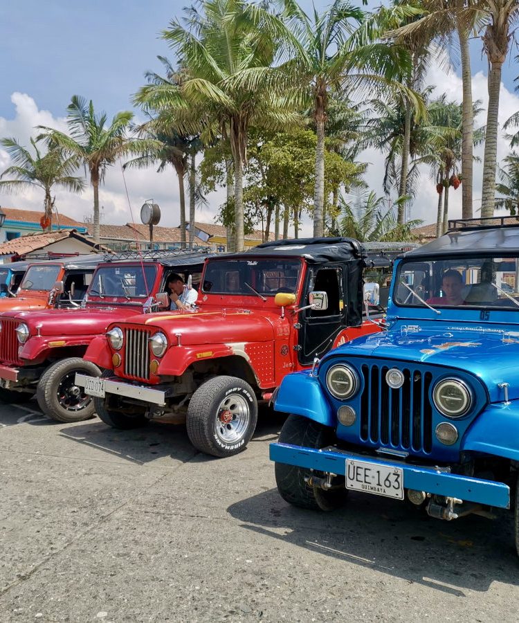 Public peeps parked at Salento's main square, a smart way to get around after you have found out how to get to Salento