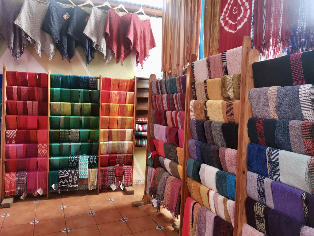 The interior of a store selling mayan textiles in San Juan La Laguna