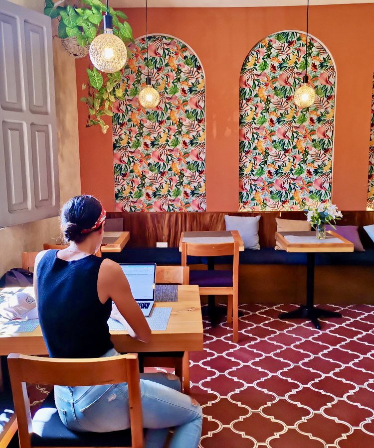 A woman working at one of the best cafes Antigua Guatemala has to offer