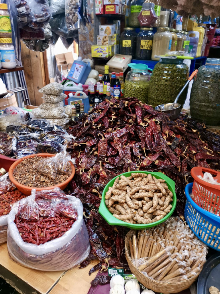 A pile of chiles and herbs at a market in Guatemala