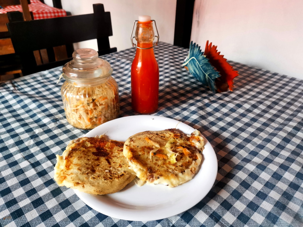Two pupusas on a plate