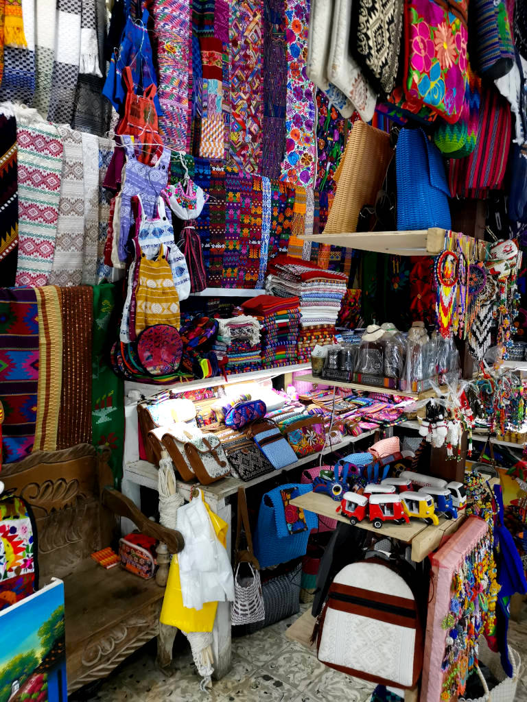 A stand selling souvenirs at the artisans market a cheap thing to do in Antigua Guatemala