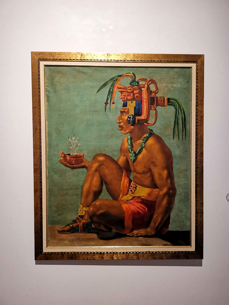 A painting of a Mayan man with decoration on his head