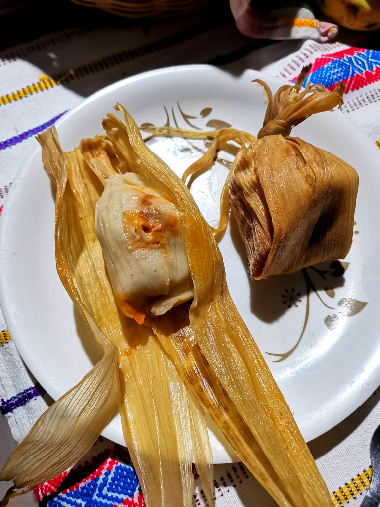 A tamales on a plate, a popular street food in Guatemala