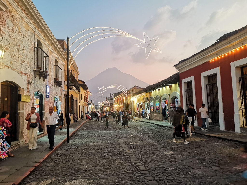Christmas decoration lit up at sunset in one of the main streets of Antigua Guatemala