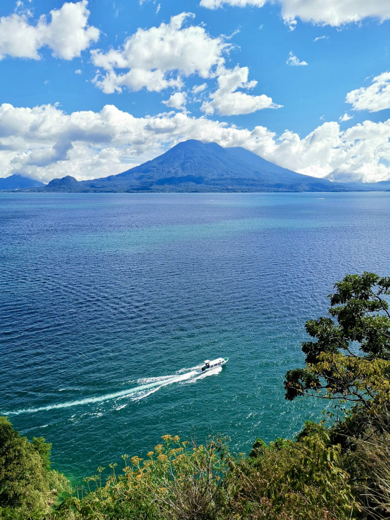 A public boat driving across Lake Atitlan - the best way to get around the Lake