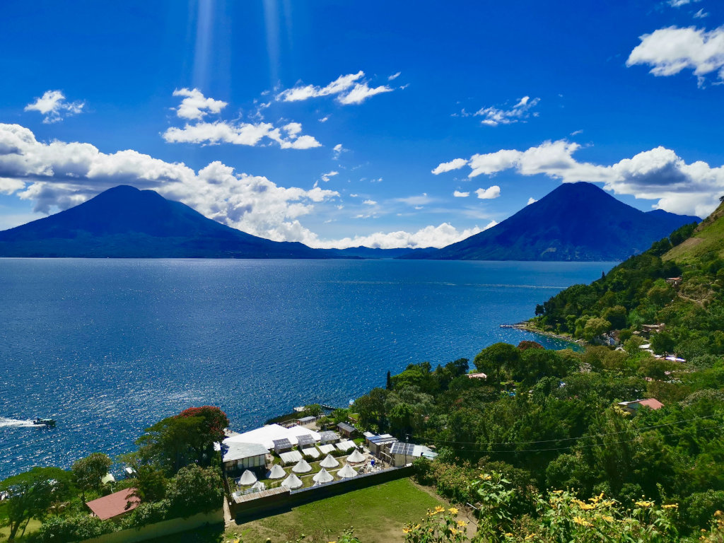 A cliffside view of Lake Atitlan and San Pedro Volcano from the Lower Mayan Trail on Lake Atitlan