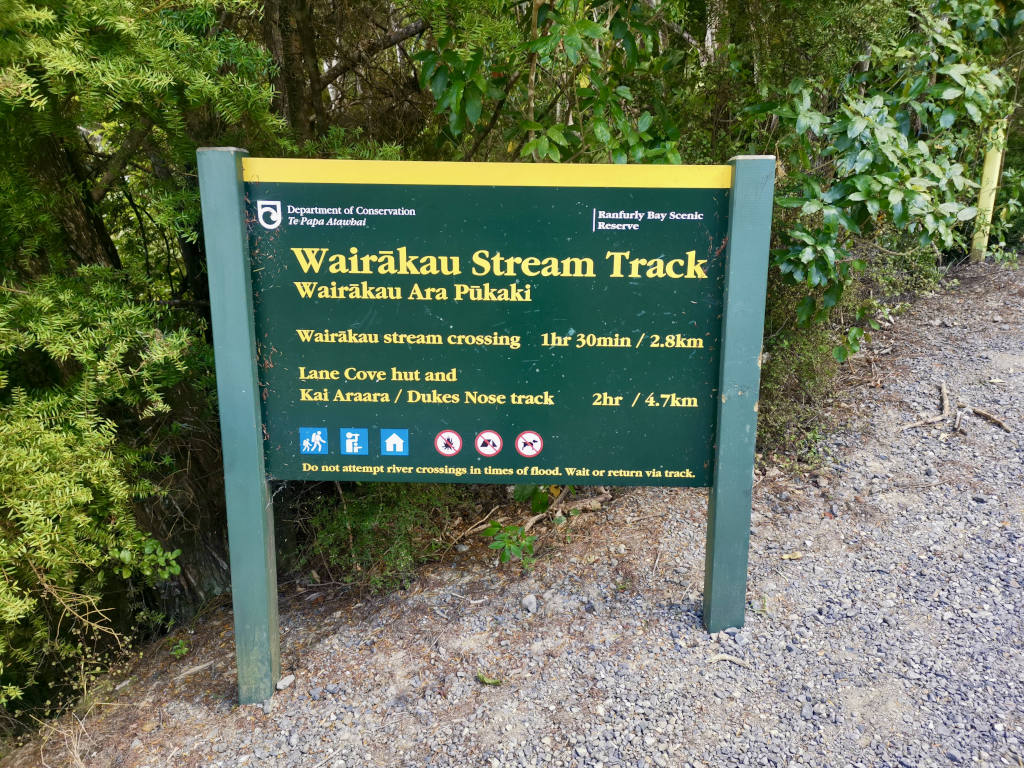 A sign showing the starting point of the Waikarau Stream Trail