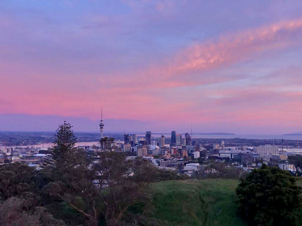A purple sunset over the top of Auckland New Zealand