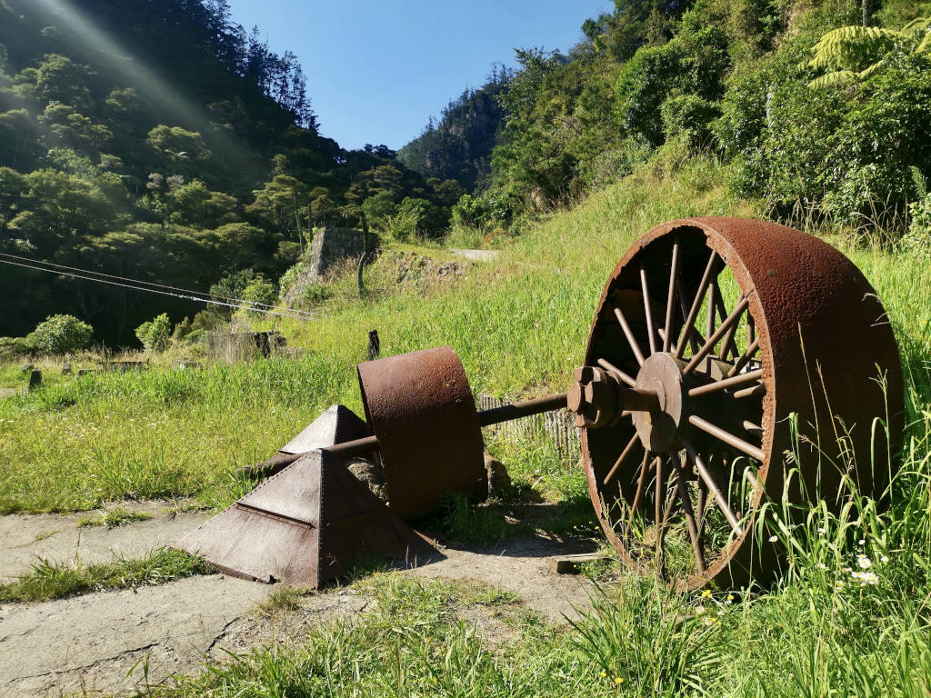 A rusted wheel at the entrance to Karangahake Gorge