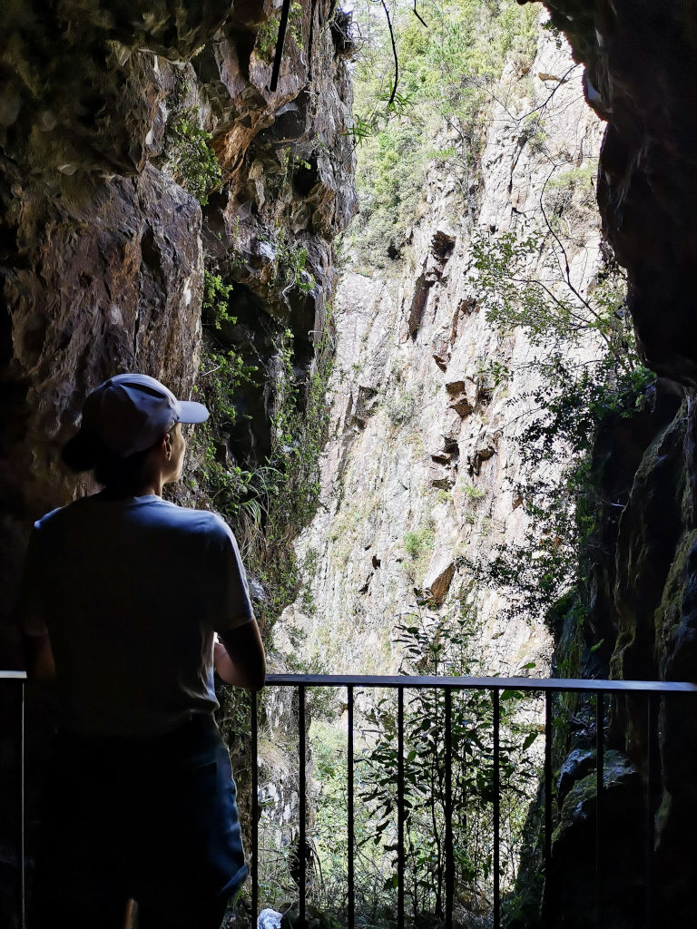 A woman looking through a mining window