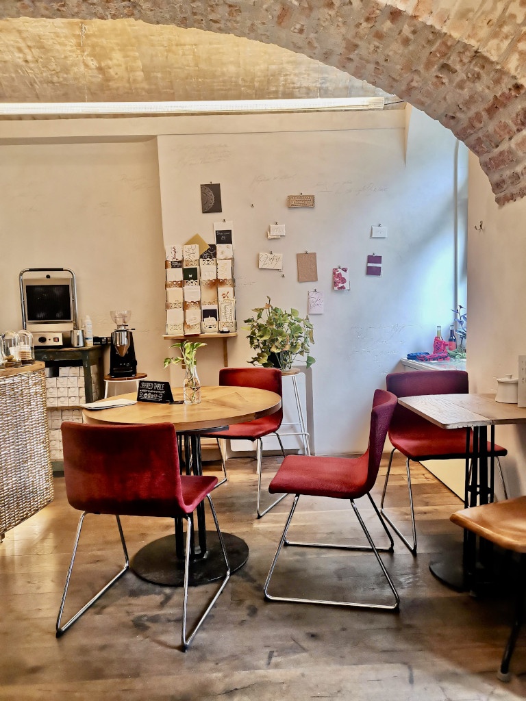 The seating area at LetterPress Cafe where you can find some of the best coffee in Prague