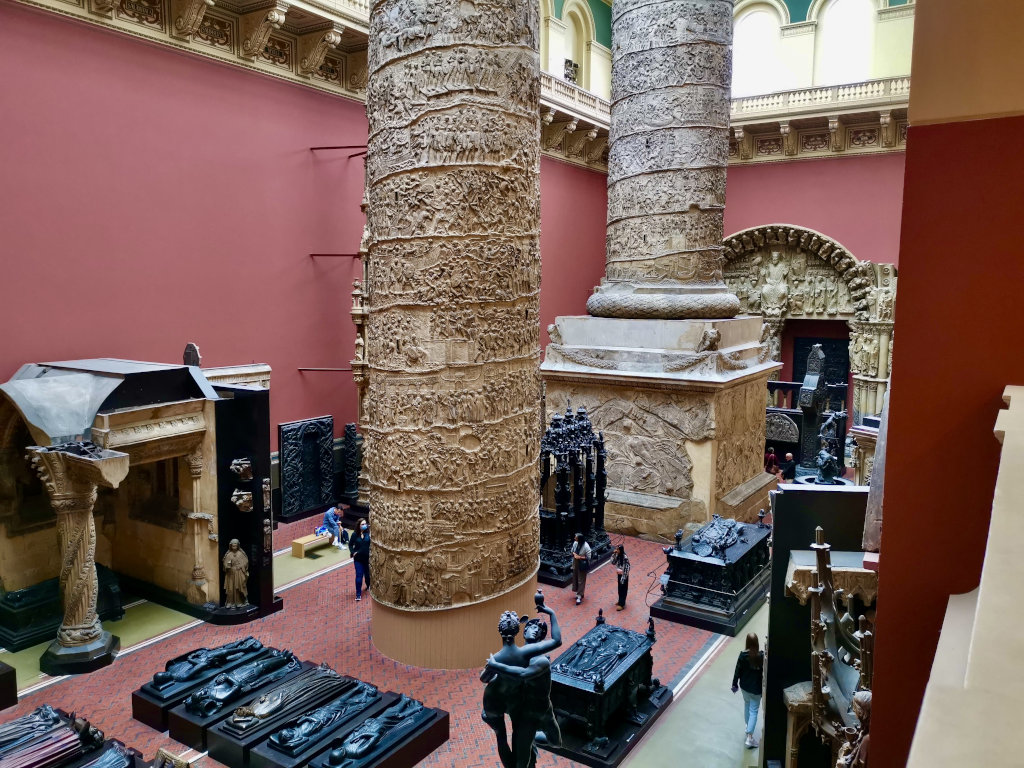 people looking at large columns inside the v&a museum 