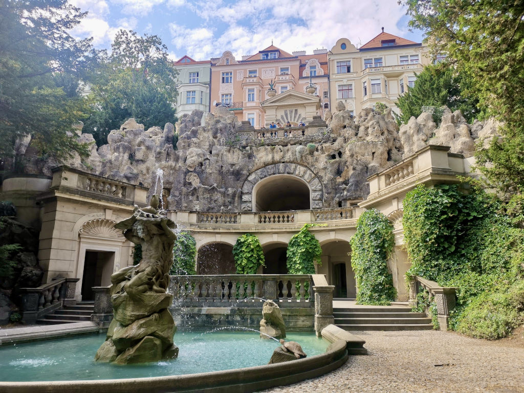 A fountain in front of the grotto a man made cave in grebovka park in prague