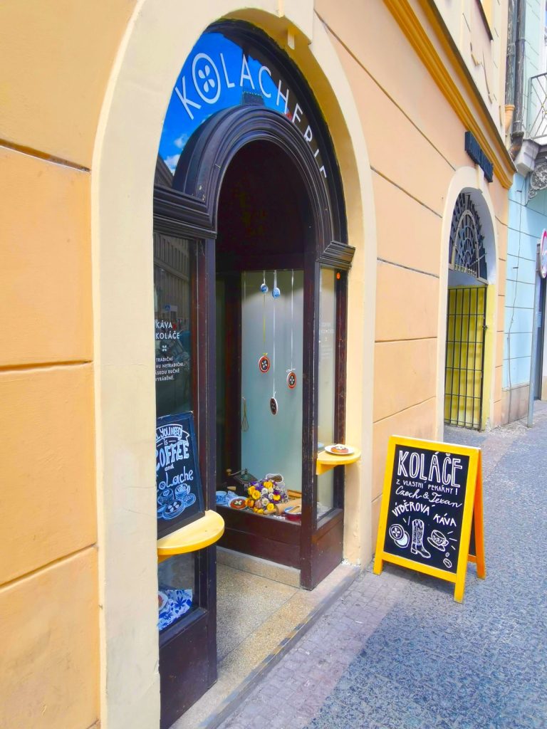 The entrance to Kolacherie, one of Prague's best Old Town cafes and a perfect spot to get your coffeine fix on your 2-Day Prague itinerary.