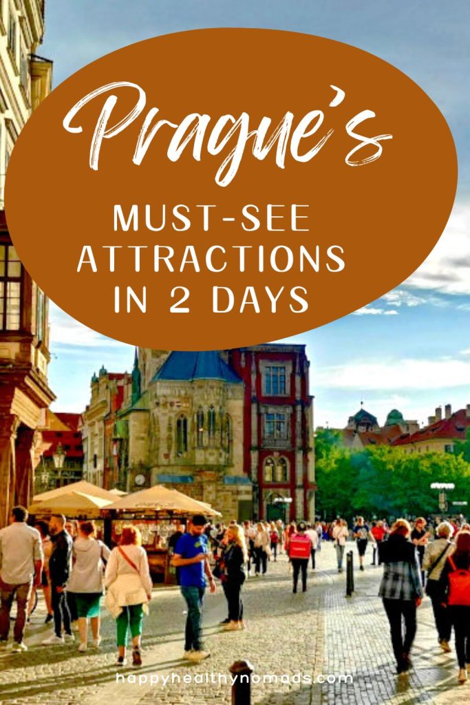 People walking over Prague's Old Town Square towards the Town Hall with a text overlay saying "Prague's must-see attractions in 2 Days".