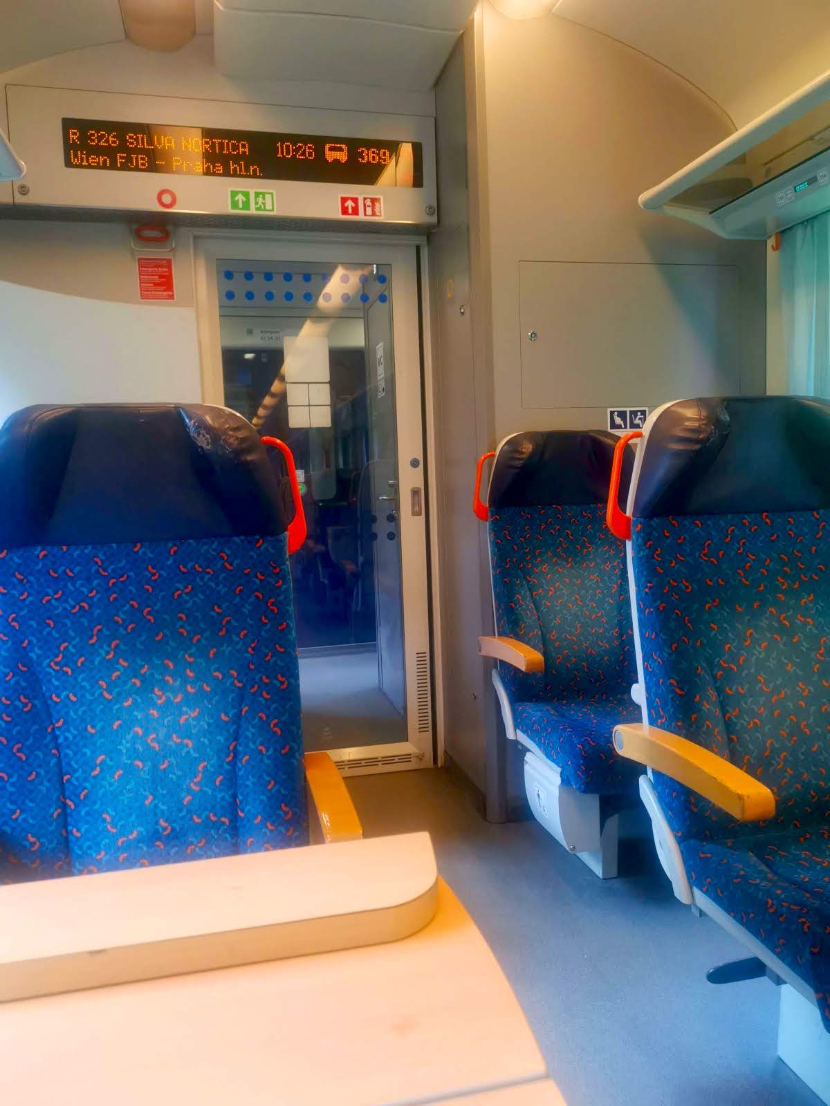 Empty blue seats in a ÖBB train from Vienna to Prague.