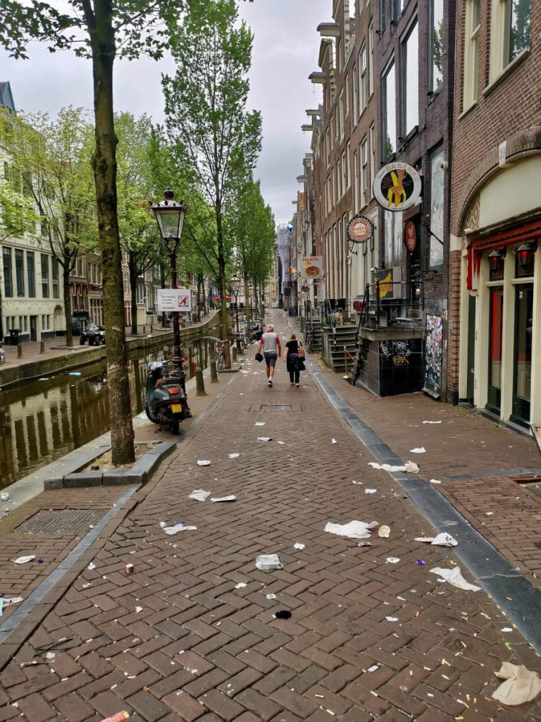 Trash on the streets of the red light district in amsterdam