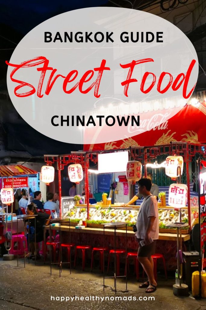 A vibrant street food scene in Bangkok's Chinatown, with a food stall illuminated at night, and the text 'Bangkok Guide Street Food Chinatown' above it in red.