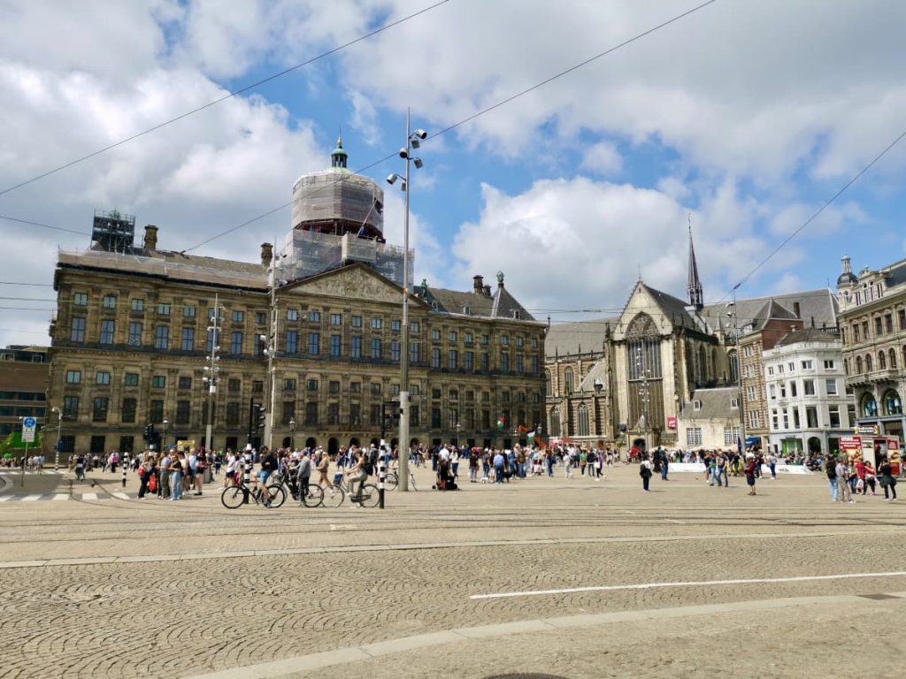 People gathered in the middle of dam square one of the main squares in amsterdam